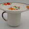 This is the backside which shows no design on the mug.